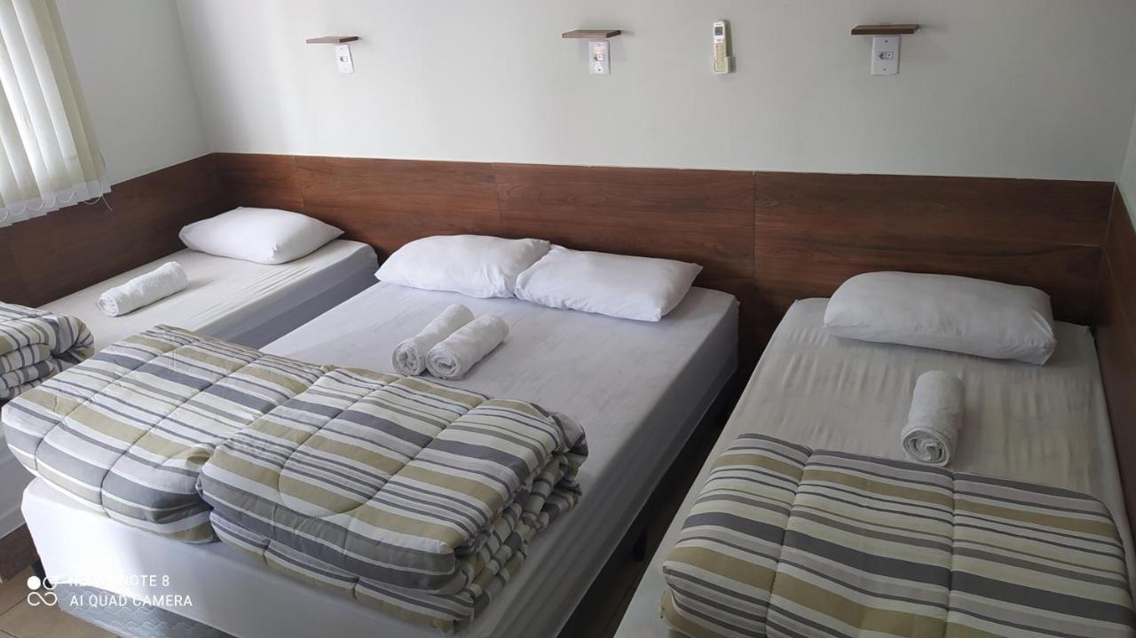 Quarto Familiar com ar,frigobar,wi fi, garagem Aparecida  Habitación foto